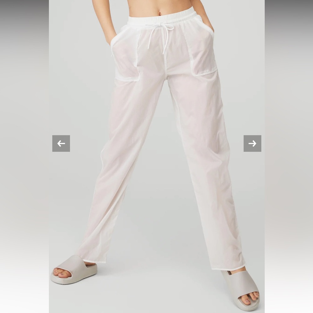 White pants (cloud nine by alo). Size xs. Never been worn. No tags